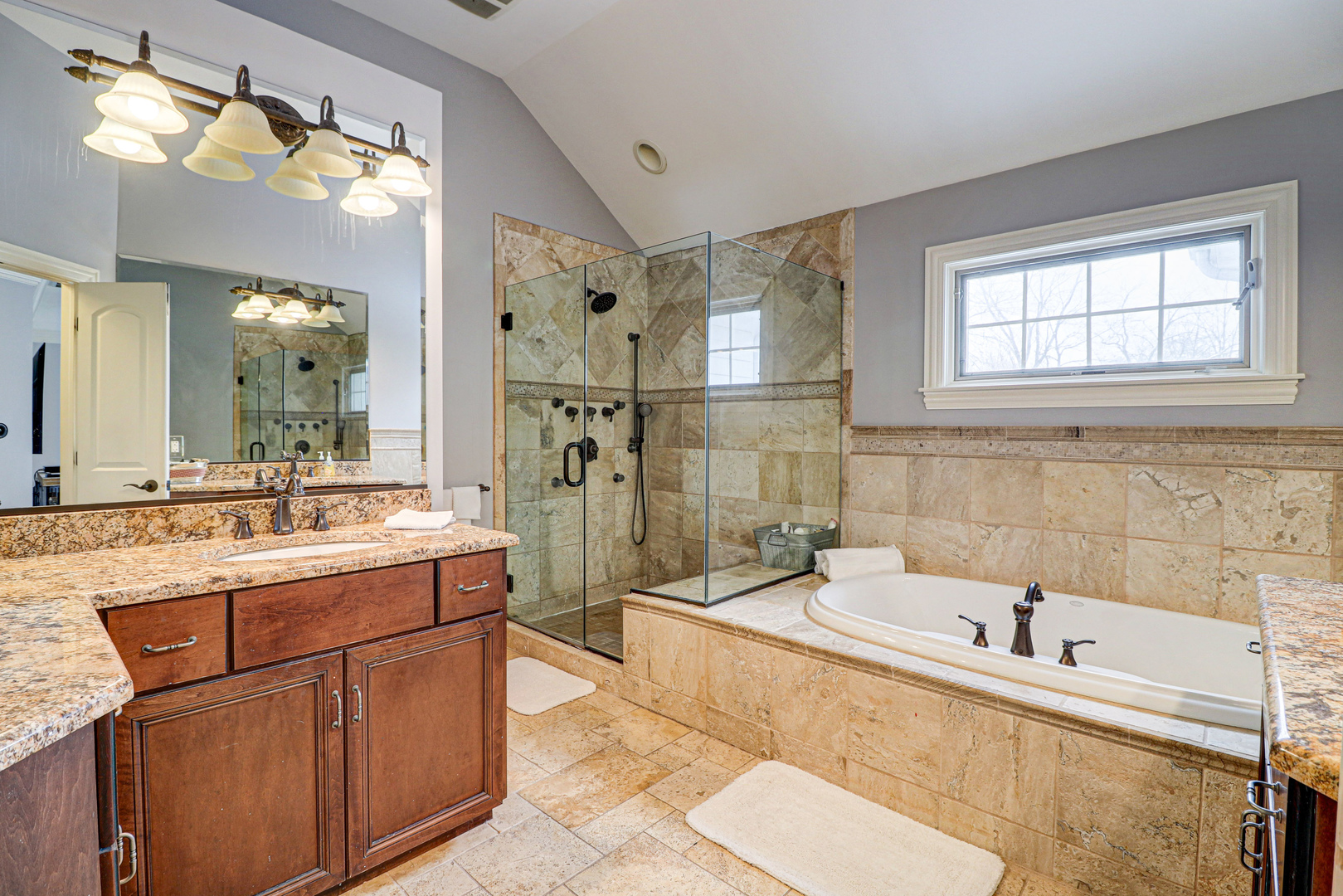 N491 Peter Road Winfield, IL 60190 - Photo 28 of 46 a bathroom with a tub sink and mirror