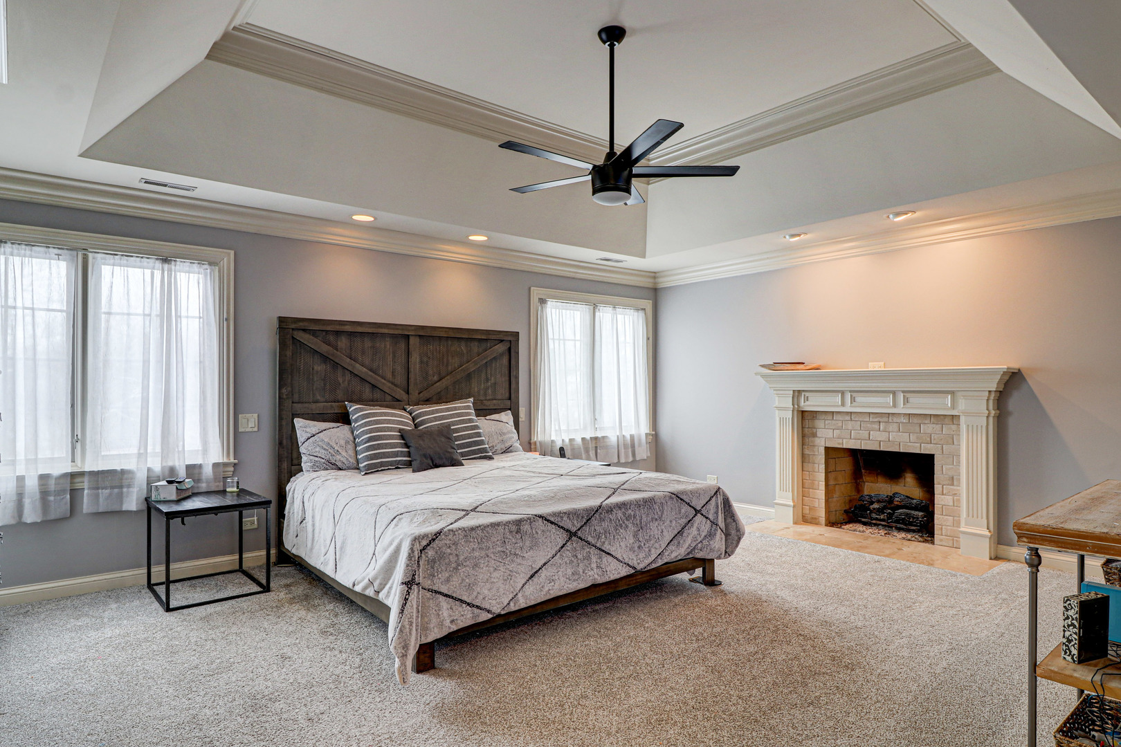 N491 Peter Road Winfield, IL 60190 - Photo 35 of 46 a bedroom with a bed and a fireplace