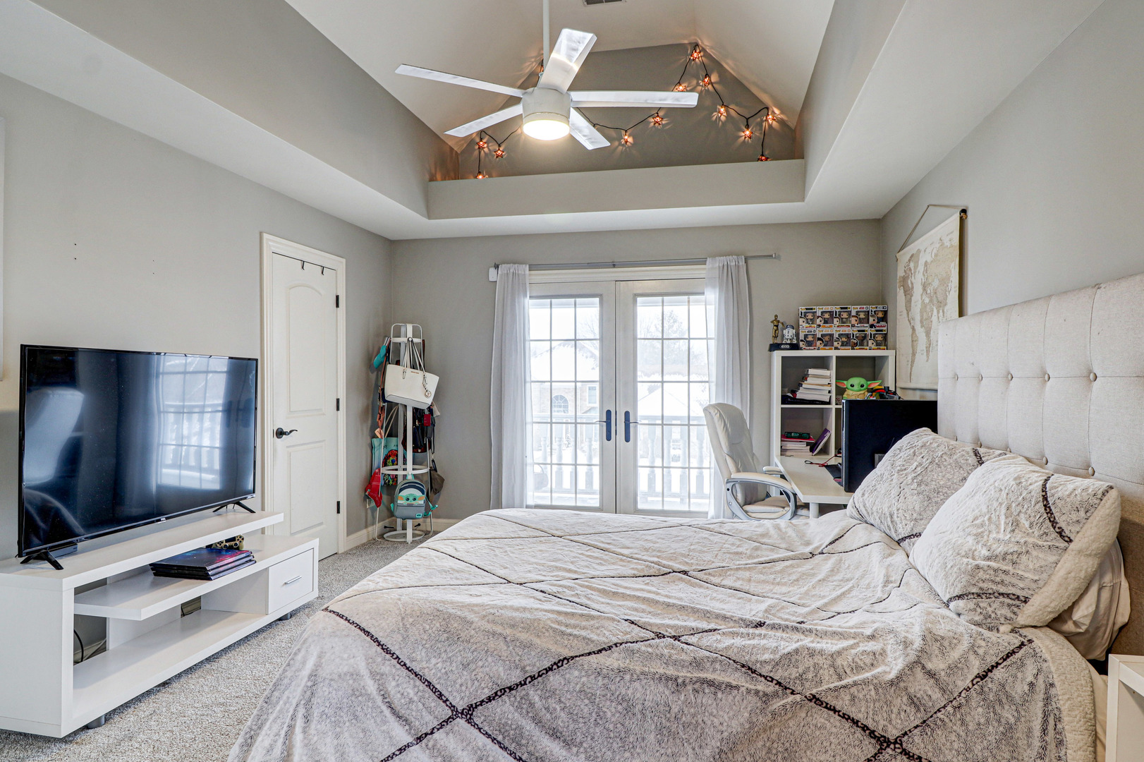 N491 Peter Road Winfield, IL 60190 - Photo 40 of 46 a bedroom with a bed and a flat tv screen on the dresser