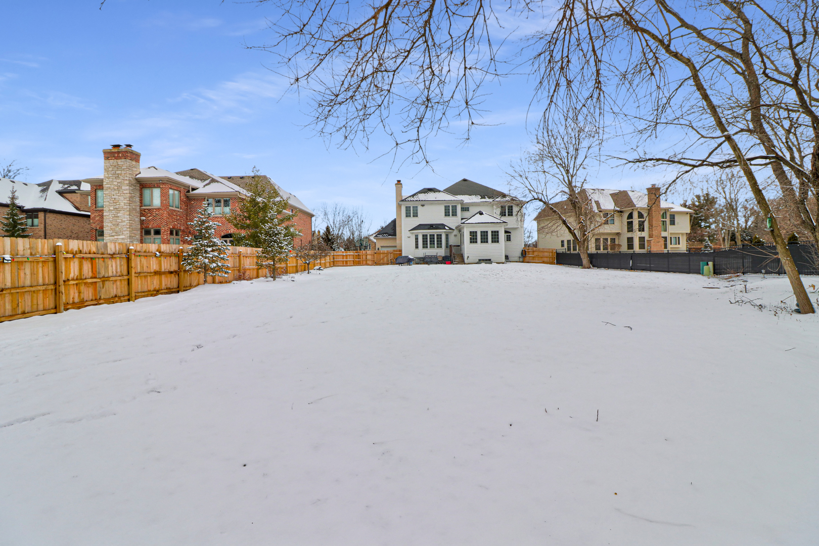 N491 Peter Road Winfield, IL 60190 - Photo 45 of 46 a view of a house with a snow in the yard