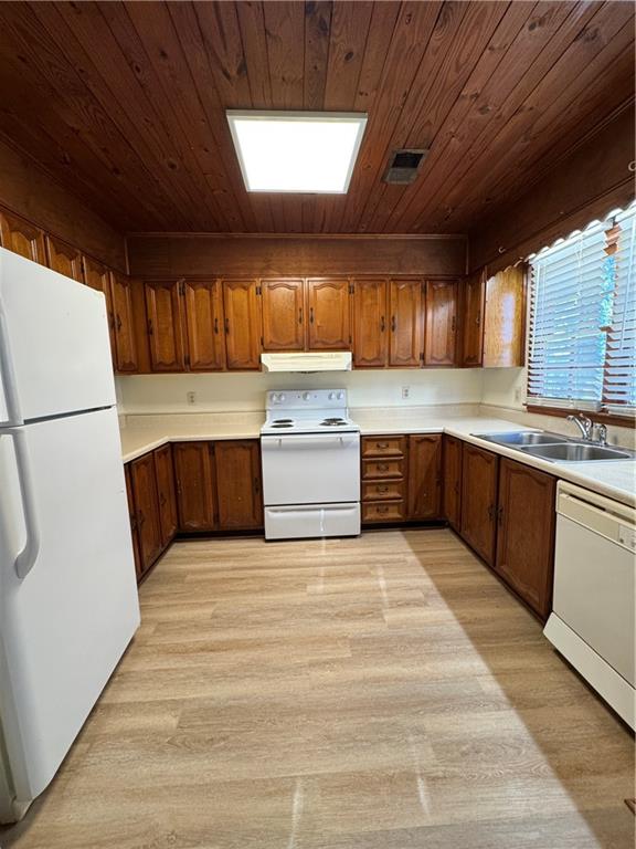 3599 Ridge Road Southeast Smyrna, GA 30080 - Photo 10 of 27 a kitchen with stainless steel appliances granite countertop a refrigerator oven a sink dishwasher and white cabinets with wooden floor