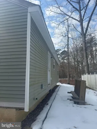 a view of a back yard of the house