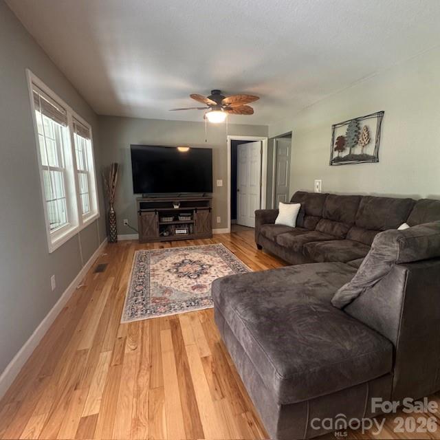 641 Camp Creek Road Union Mills, NC 28167 - Photo 11 of 29 a living room with furniture and a flat screen tv