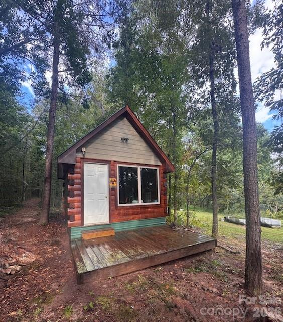 641 Camp Creek Road Union Mills, NC 28167 - Photo 23 of 29 a front view of a house with a yard and trees