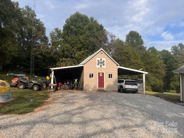a view of car parked in front of house