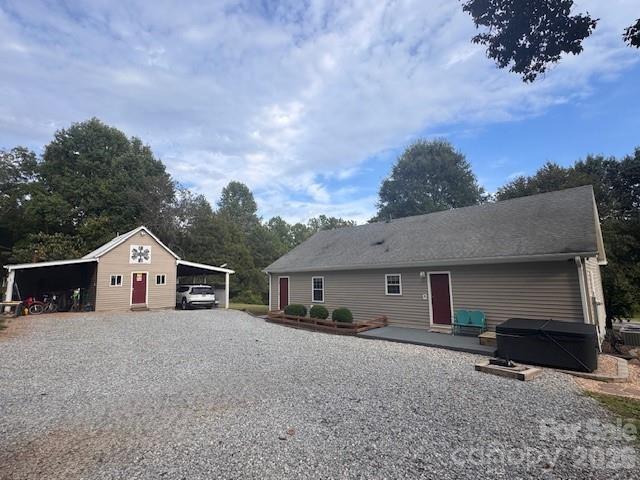 641 Camp Creek Road Union Mills, NC 28167 - Photo 4 of 29 a front view of a house with a yard and garage