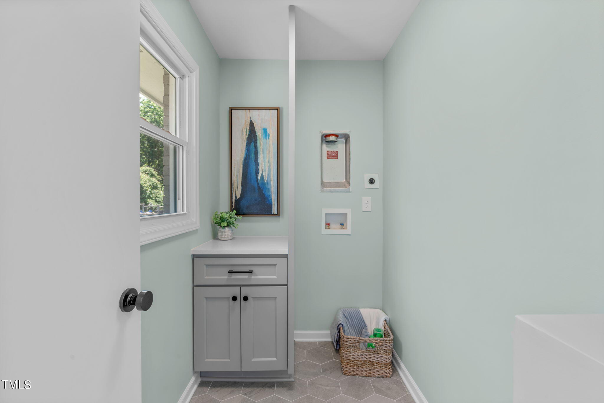 612 Delany Drive Raleigh, NC 27610 - Photo 18 of 45 a room with a window and mirror