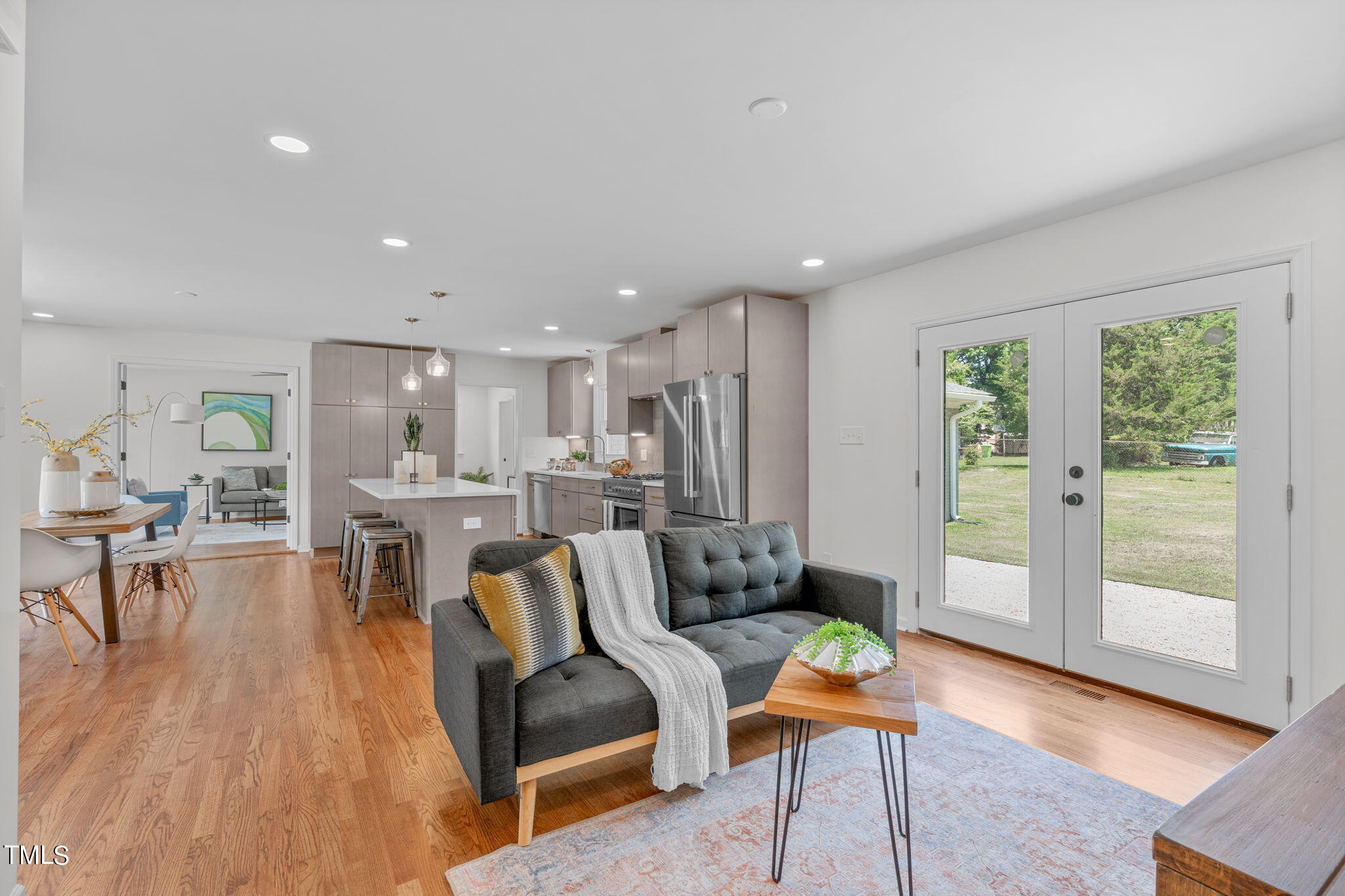 612 Delany Drive Raleigh, NC 27610 - Photo 19 of 45 a living room with furniture and a large window