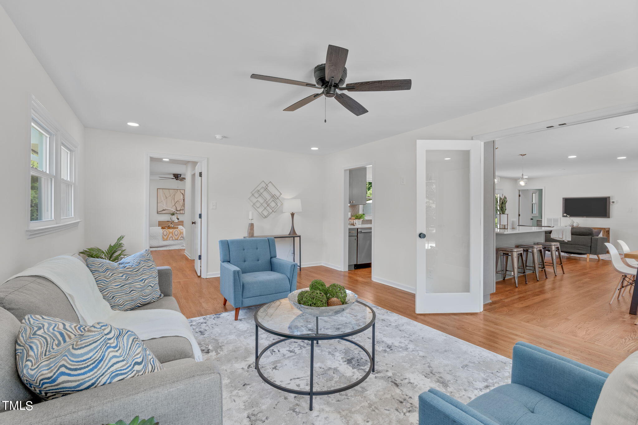 612 Delany Drive Raleigh, NC 27610 - Photo 23 of 45 a living room with furniture and a view of kitchen