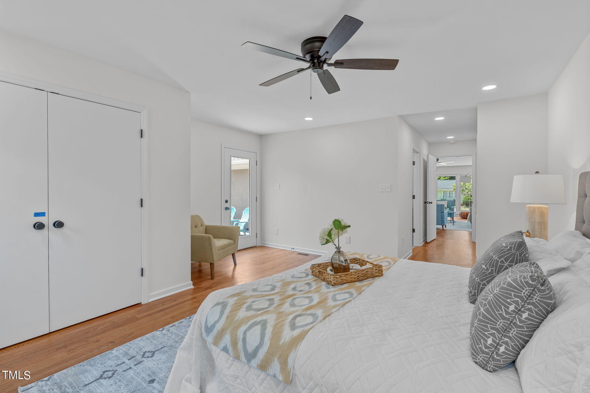 612 Delany Drive Raleigh, NC 27610 - Photo 29 of 45 a bed room with a bed and a chandelier