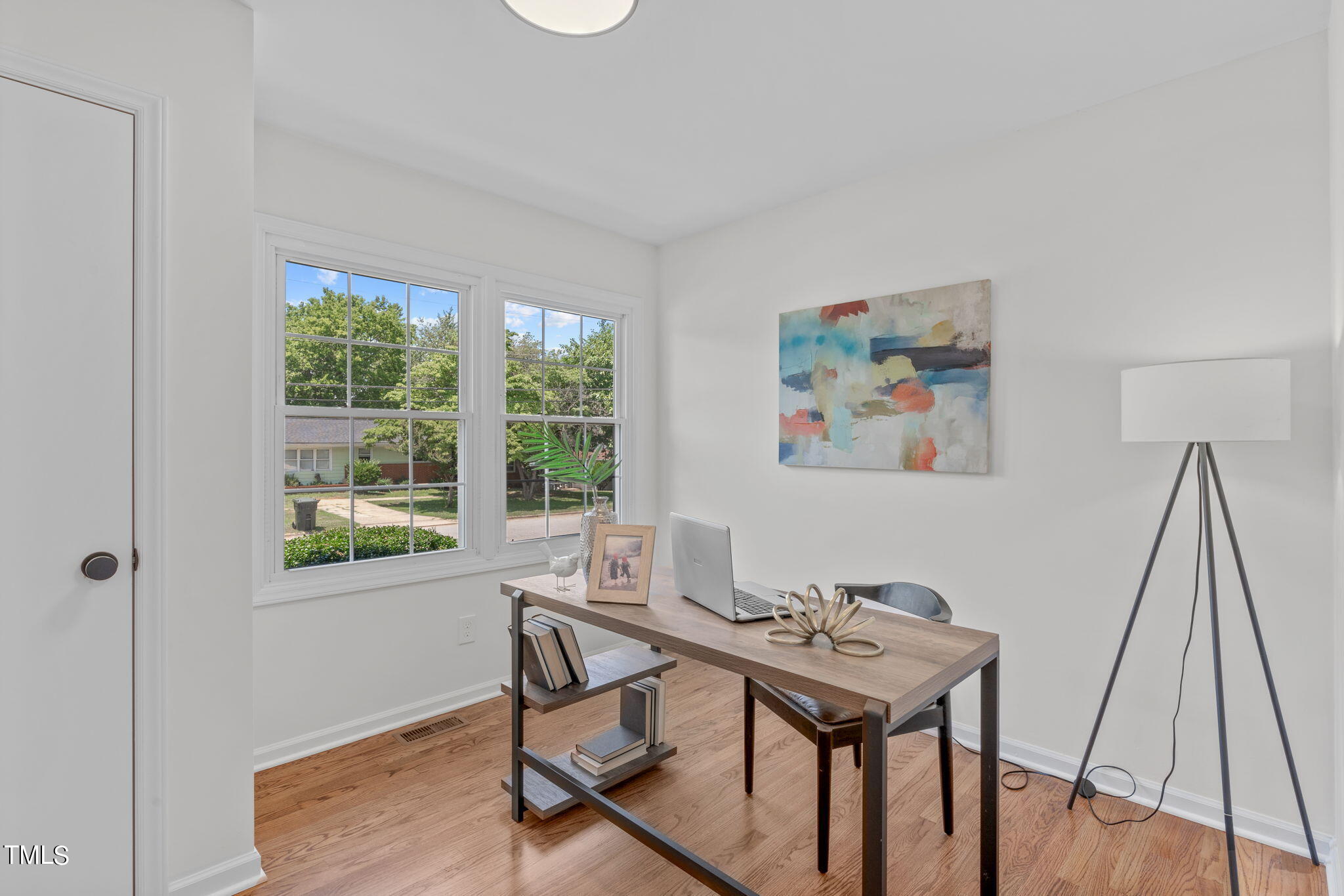 612 Delany Drive Raleigh, NC 27610 - Photo 32 of 45 a view of a workspace with furniture and a window