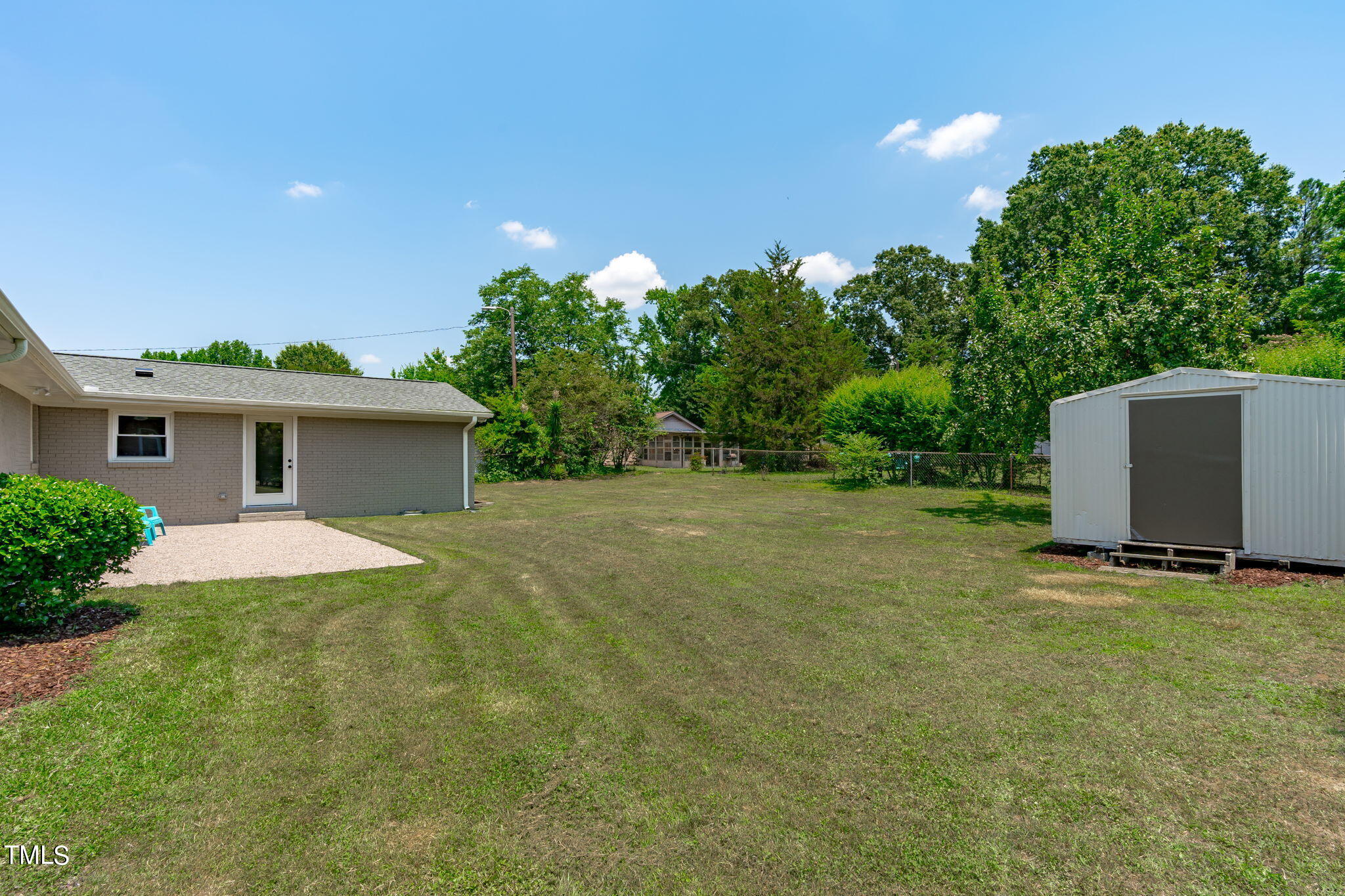 612 Delany Drive Raleigh, NC 27610 - Photo 40 of 45 a backyard of a house with lots of green space
