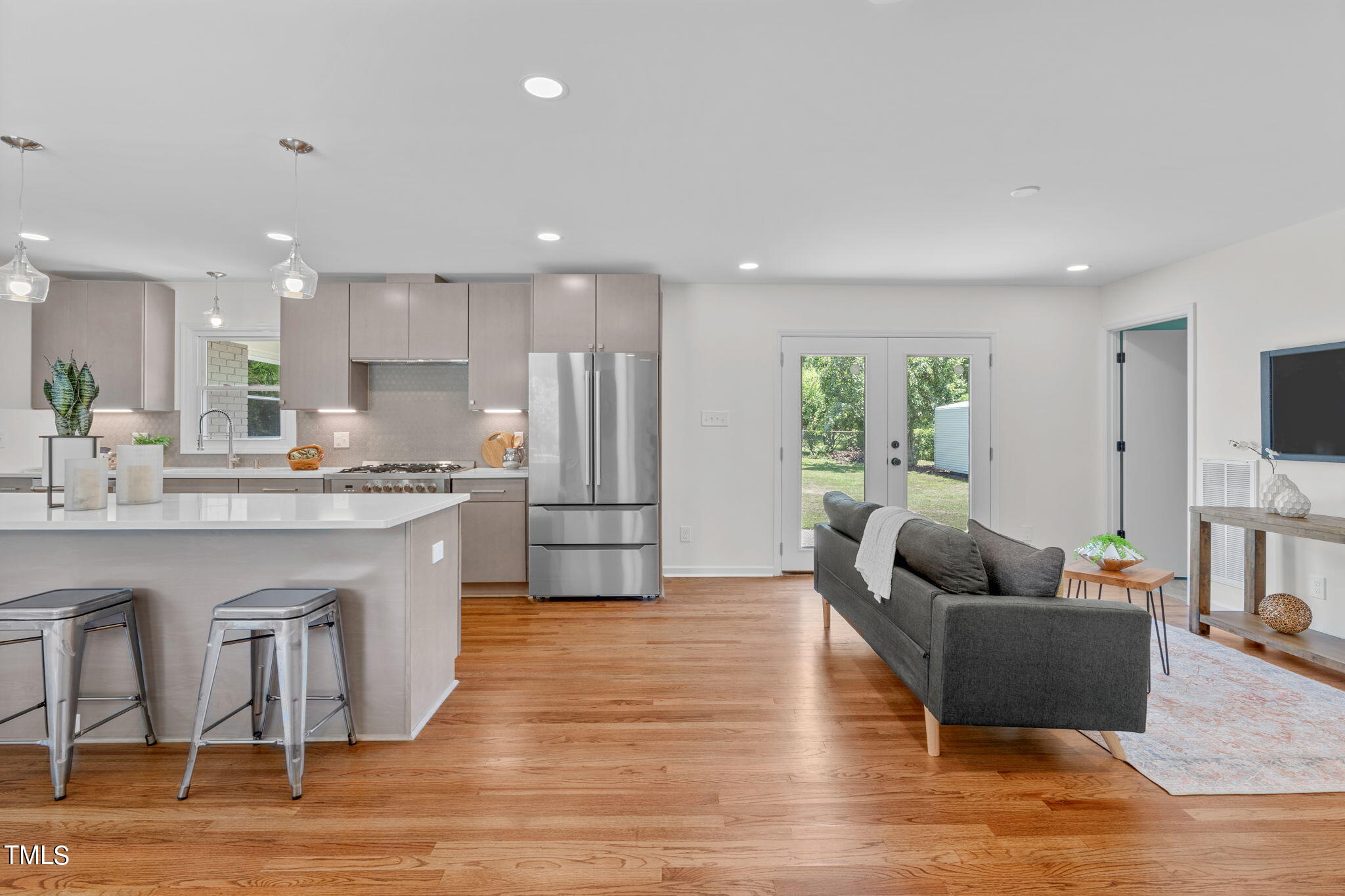 612 Delany Drive Raleigh, NC 27610 - Photo 4 of 45 a living room with furniture and a flat screen tv