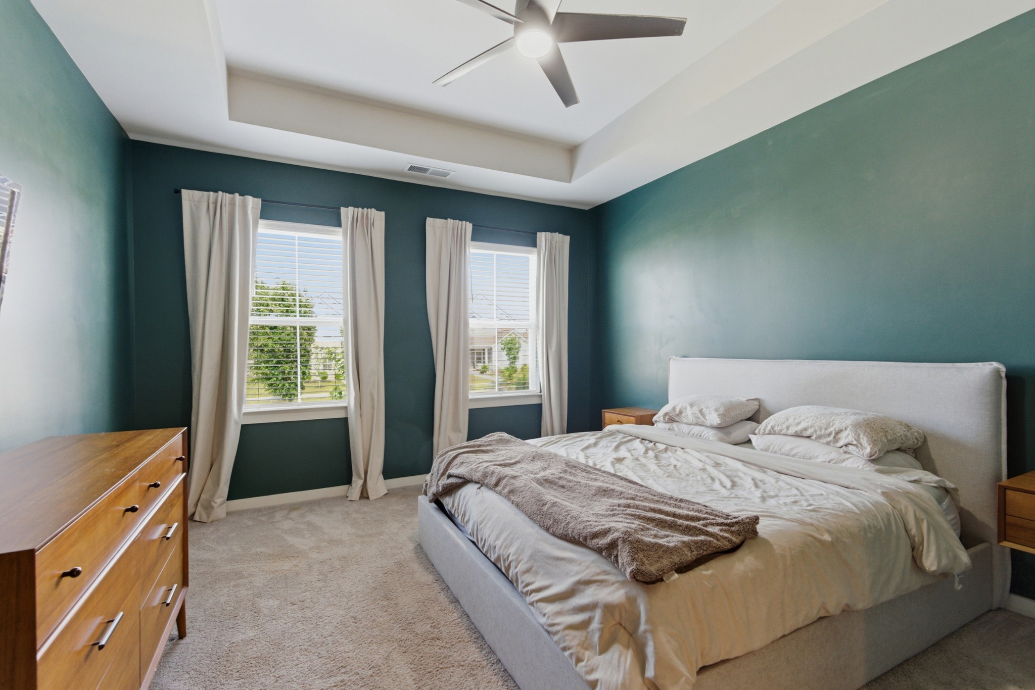 165 Harvest Point Boulevard Spring Hill, TN 37174 - Photo 13 of 28 a bedroom with a bed and a dresser
