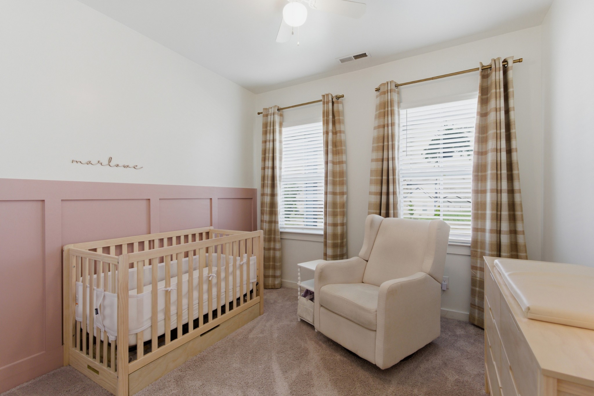 165 Harvest Point Boulevard Spring Hill, TN 37174 - Photo 17 of 28 a bed sitting in a bedroom next to a window