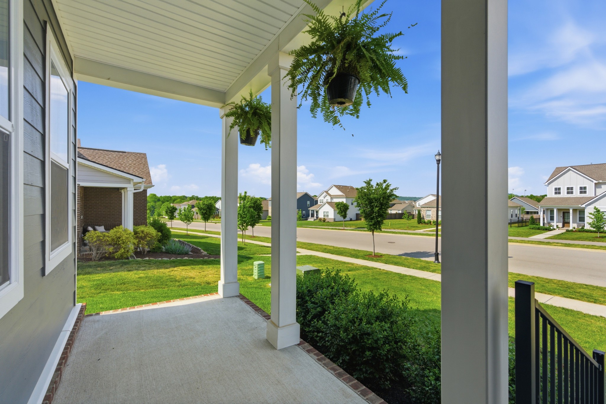 165 Harvest Point Boulevard Spring Hill, TN 37174 - Photo 3 of 28 a view of a house with backyard and porch