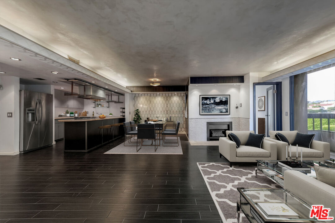 10590 Wilshire Boulevard, Unit 504 Los Angeles, CA 90024 - Photo 16 of 53 a living room with furniture and a flat screen tv