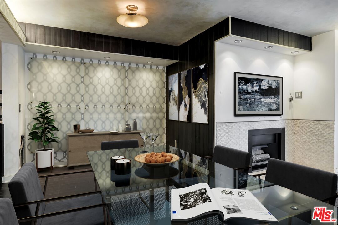 10590 Wilshire Boulevard, Unit 504 Los Angeles, CA 90024 - Photo 20 of 53 a living room with furniture and a fireplace