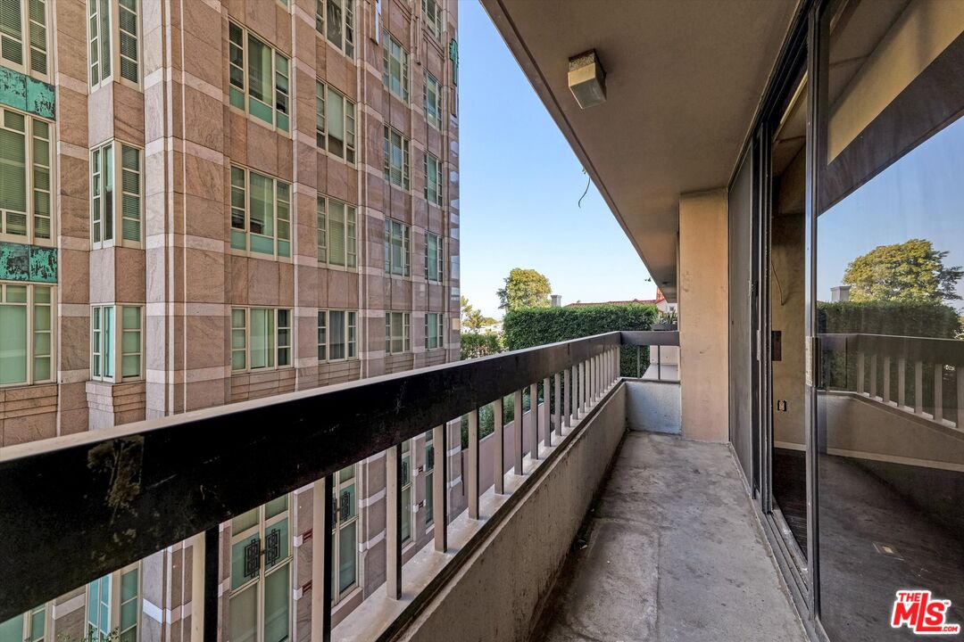 10590 Wilshire Boulevard, Unit 504 Los Angeles, CA 90024 - Photo 23 of 53 a view of balcony with wooden floor