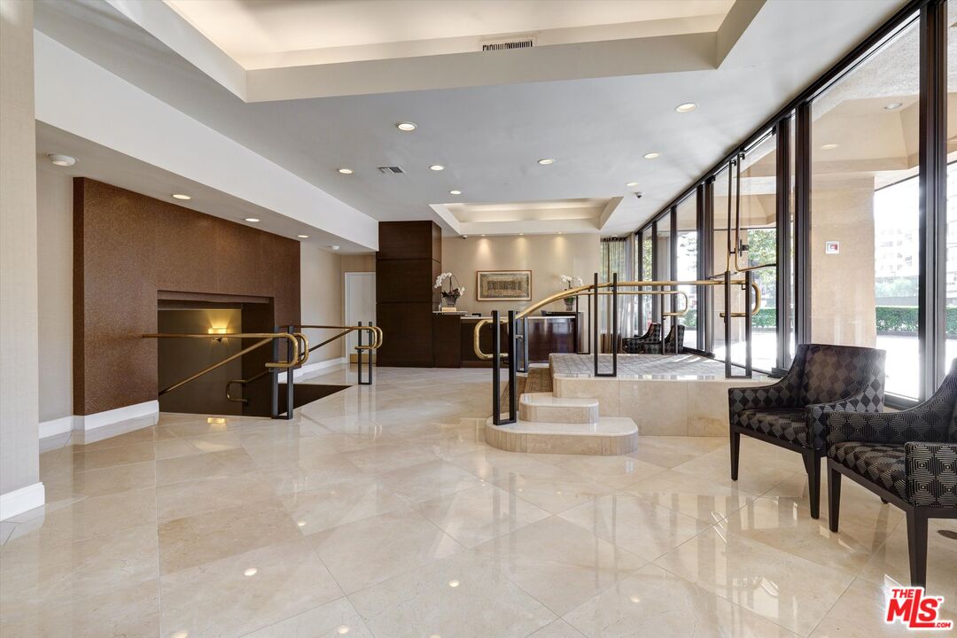 10590 Wilshire Boulevard, Unit 504 Los Angeles, CA 90024 - Photo 4 of 53 a view of a room with gym equipment