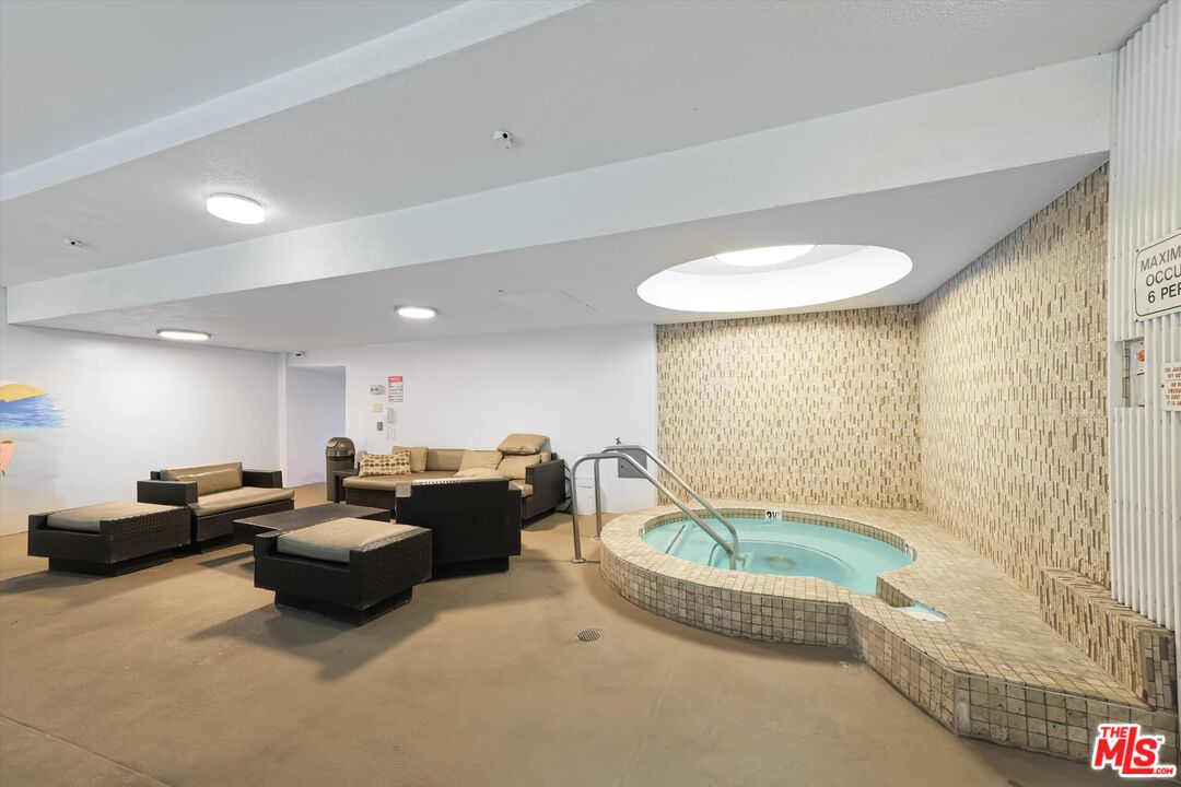 10590 Wilshire Boulevard, Unit 504 Los Angeles, CA 90024 - Photo 42 of 53 a living room with furniture