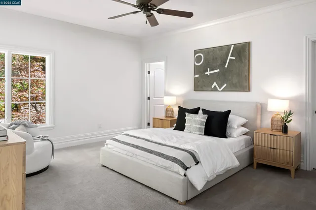 a bedroom with bed and window