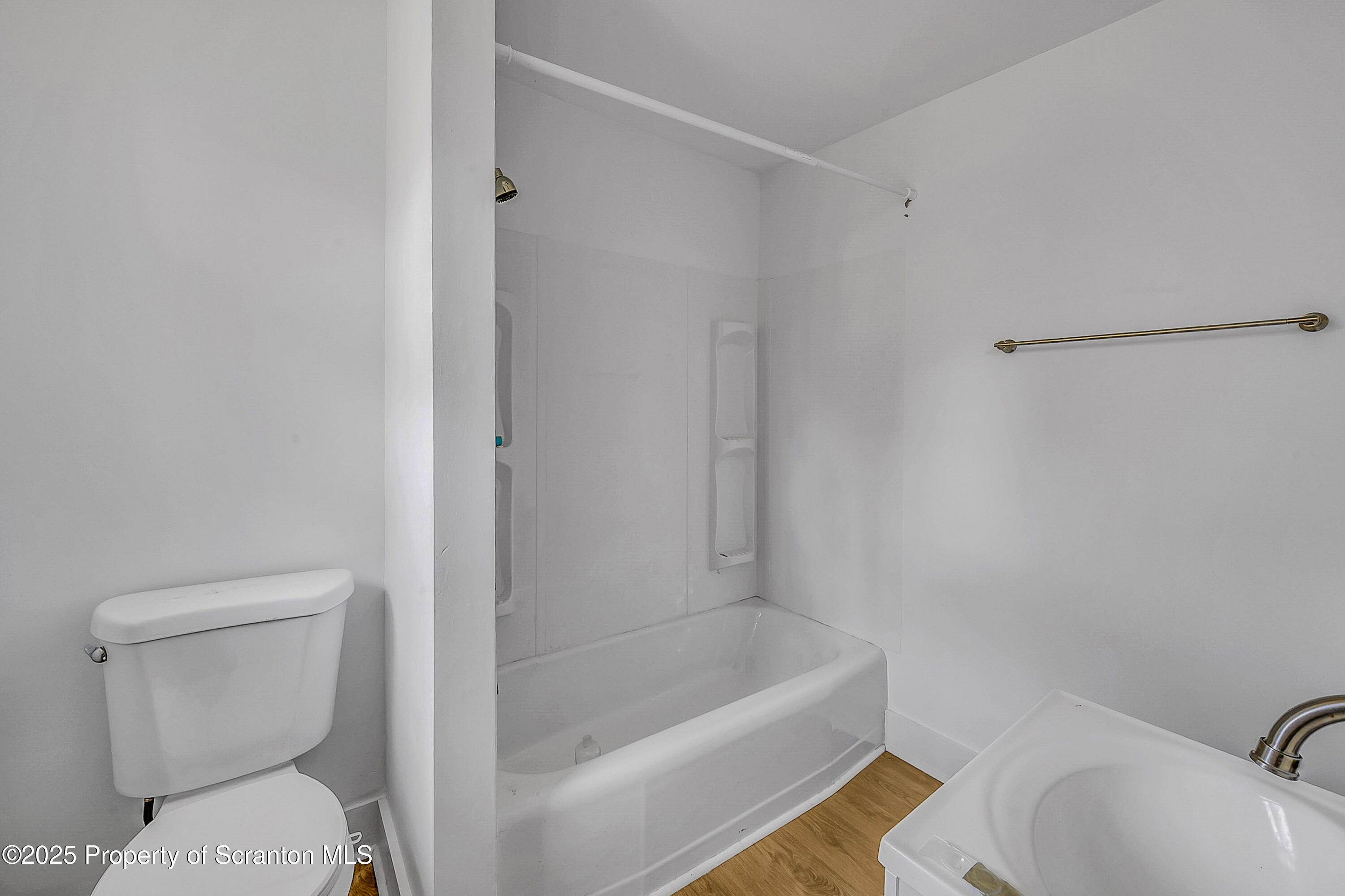 1005 Luke Avenue Scranton, PA 18510 - Photo 14 of 15 a bathroom with a toilet and bathtub