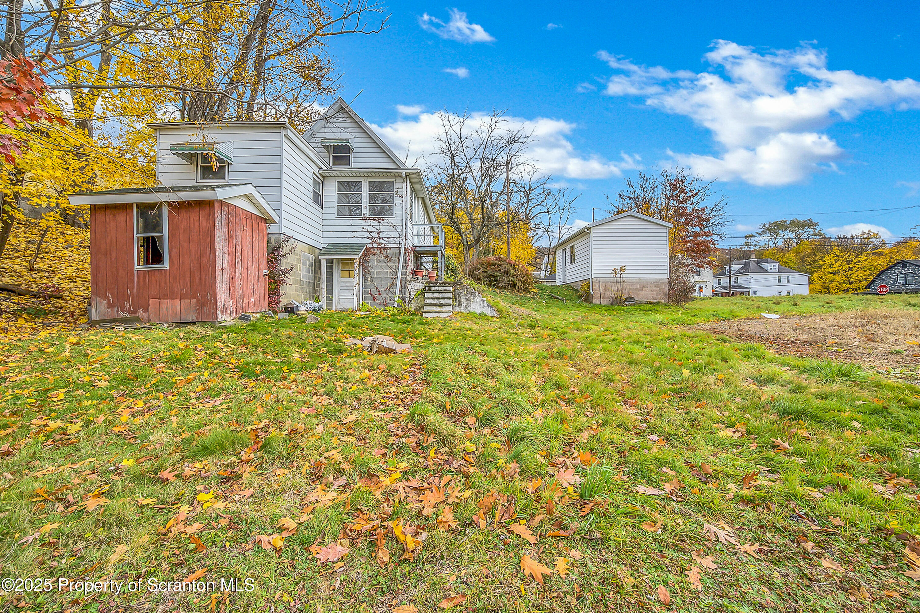 1005 Luke Avenue Scranton, PA 18510 - Photo 4 of 15 a view of a house with a big yard