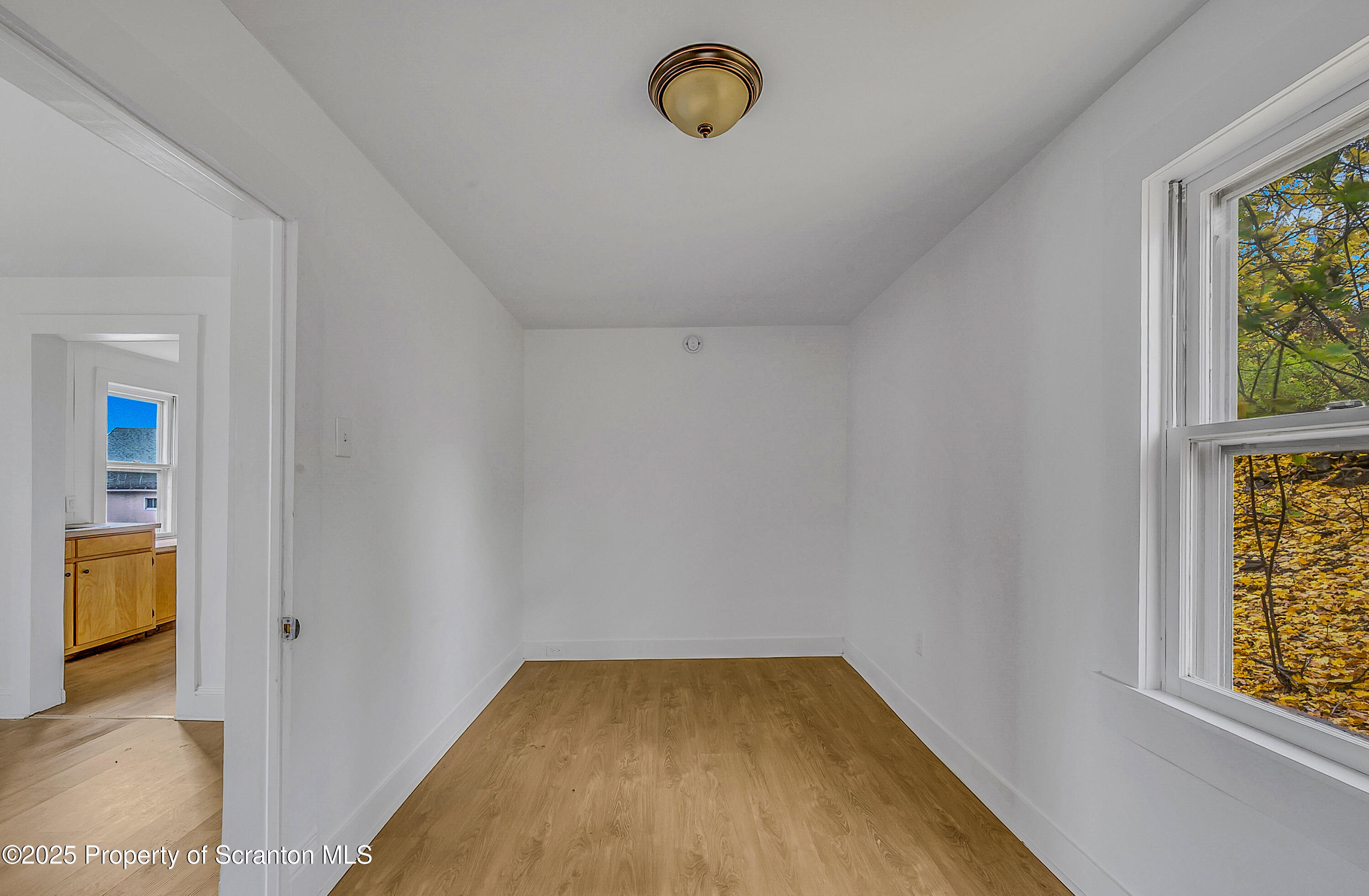 1005 Luke Avenue Scranton, PA 18510 - Photo 9 of 15 an empty room with windows