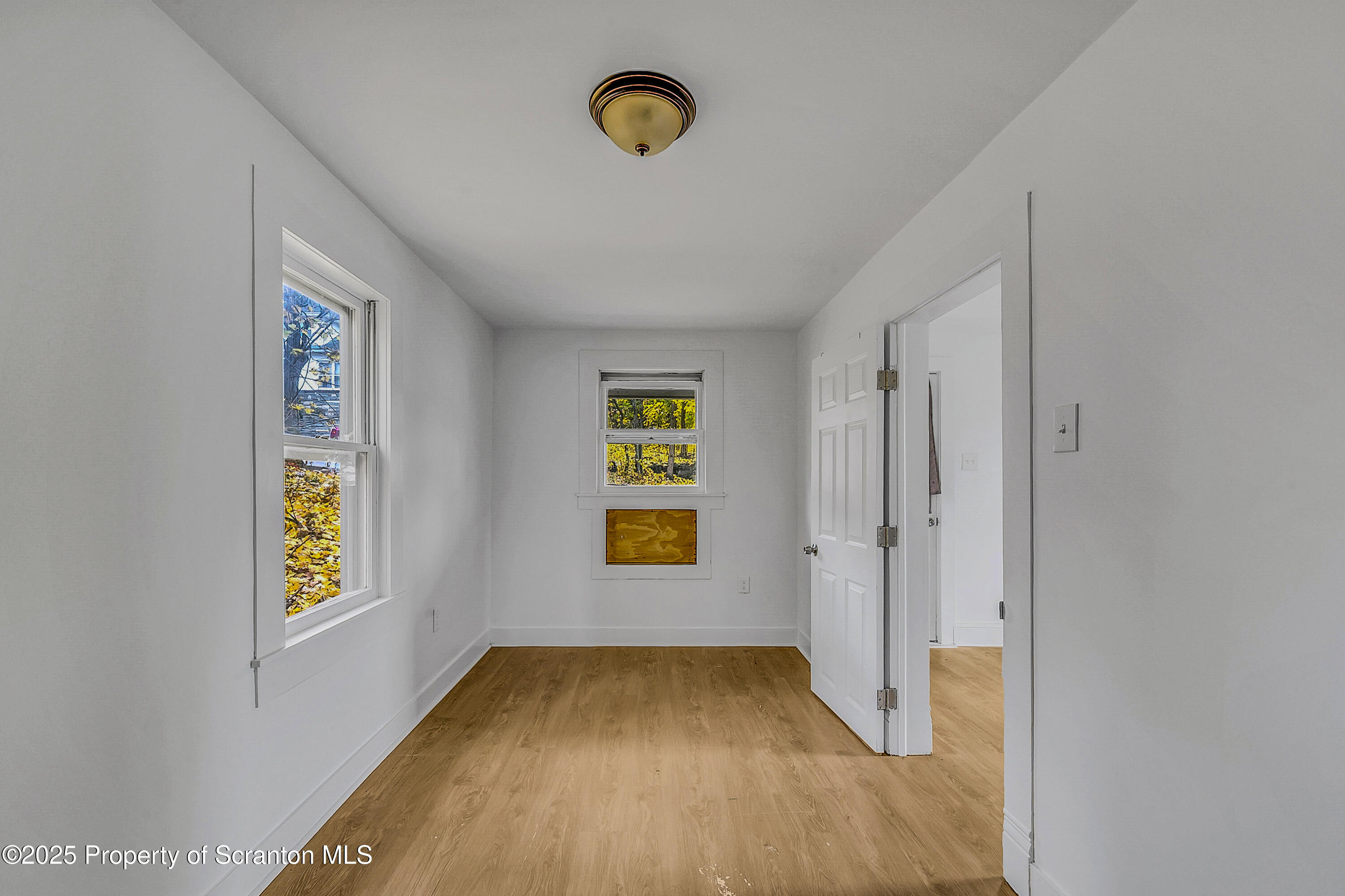 1005 Luke Avenue Scranton, PA 18510 - Photo 10 of 15 a view of an entryway with wooden floor