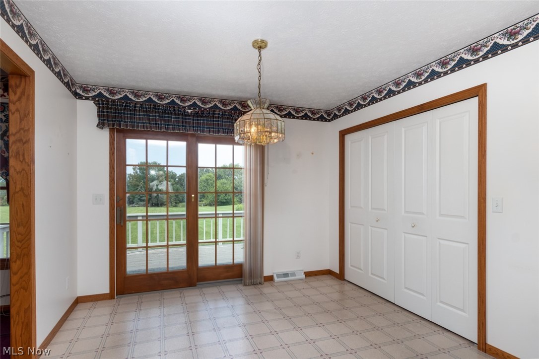 29385 Chardon Road Wickliffe, OH 44092 - Photo 10 of 29 Folding doors open to laundry