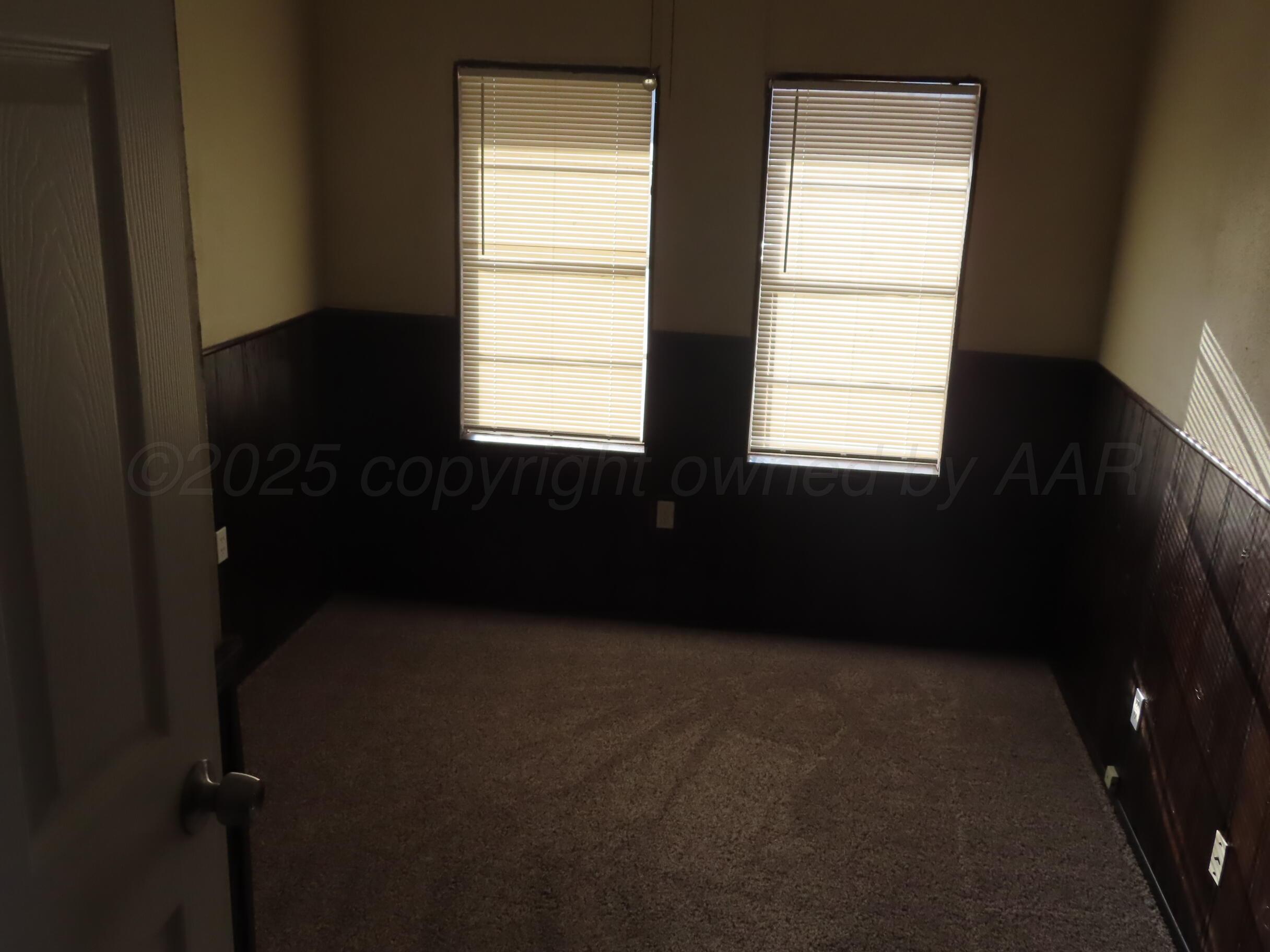2500 Chestnut Street Amarillo, TX 79107 - Photo 4 of 8 a living room with a window