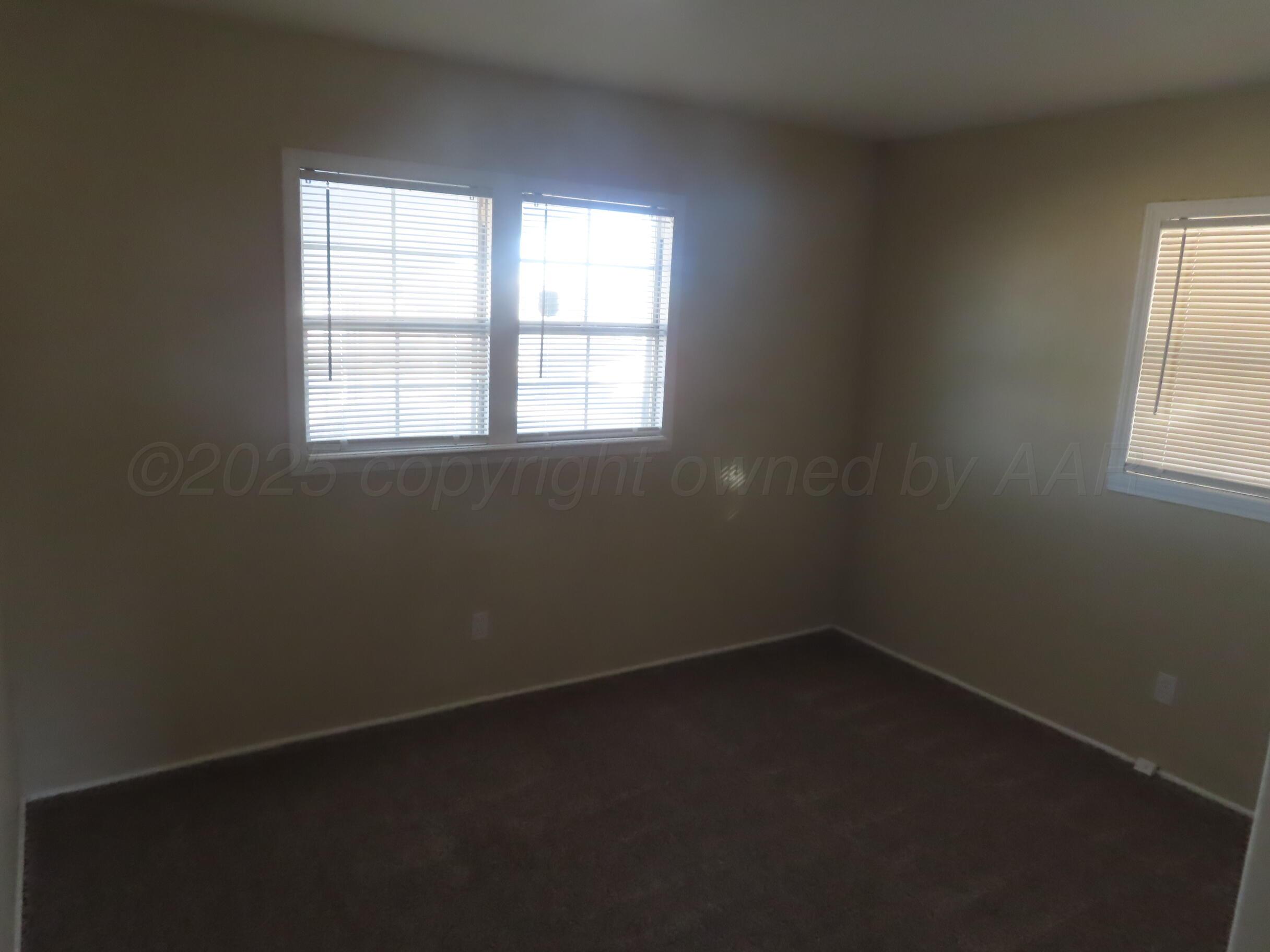 2500 Chestnut Street Amarillo, TX 79107 - Photo 7 of 8 an empty room with a window
