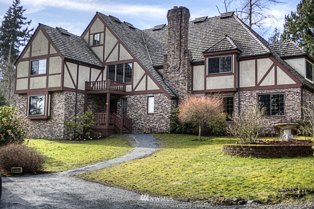310 208th Street Southeast Bothell, WA 98012 - Photo 1 of 25 a front view of a house with a yard