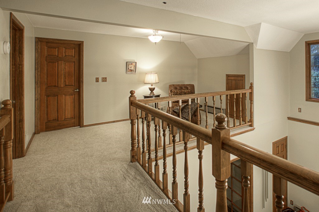 310 208th Street Southeast Bothell, WA 98012 - Photo 19 of 25 a view of an entryway with wooden floor