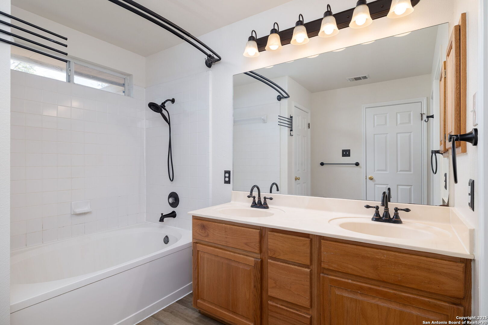 3617 Granite Schertz, TX 78154 - Photo 19 of 29 a bathroom with a double vanity sink mirror double and bathtub
