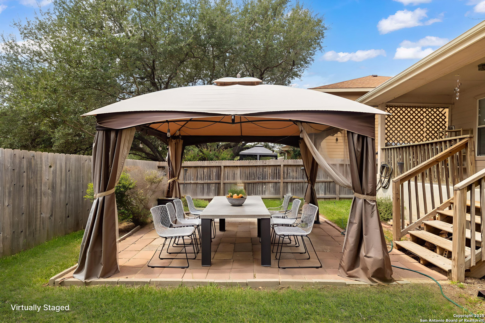 3617 Granite Schertz, TX 78154 - Photo 26 of 29 a view of backyard with table and chairs and a barbeque