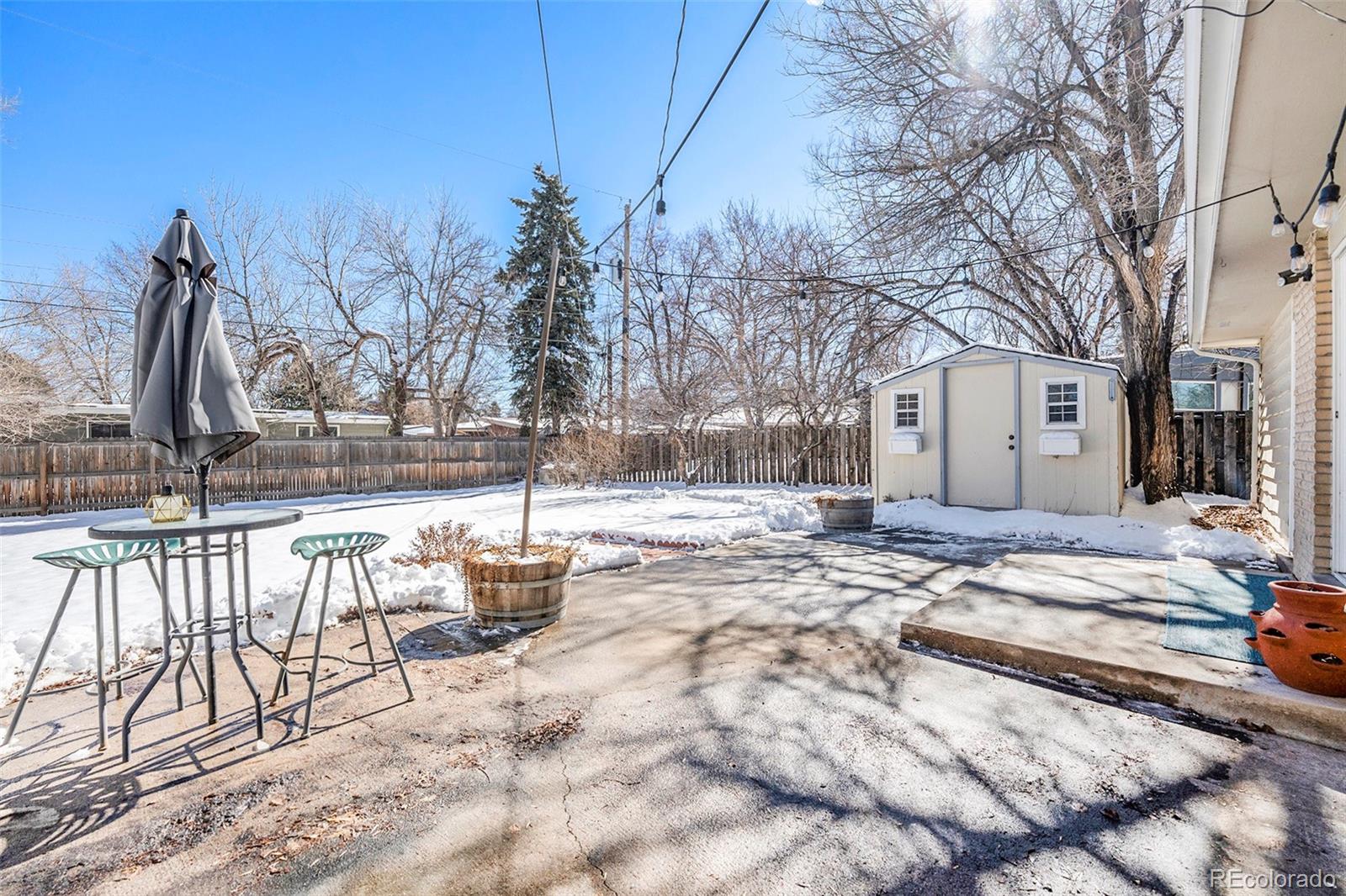 3582 Wright Street Wheat Ridge, CO 80033 - Photo 27 of 31 a view of patio with a snow