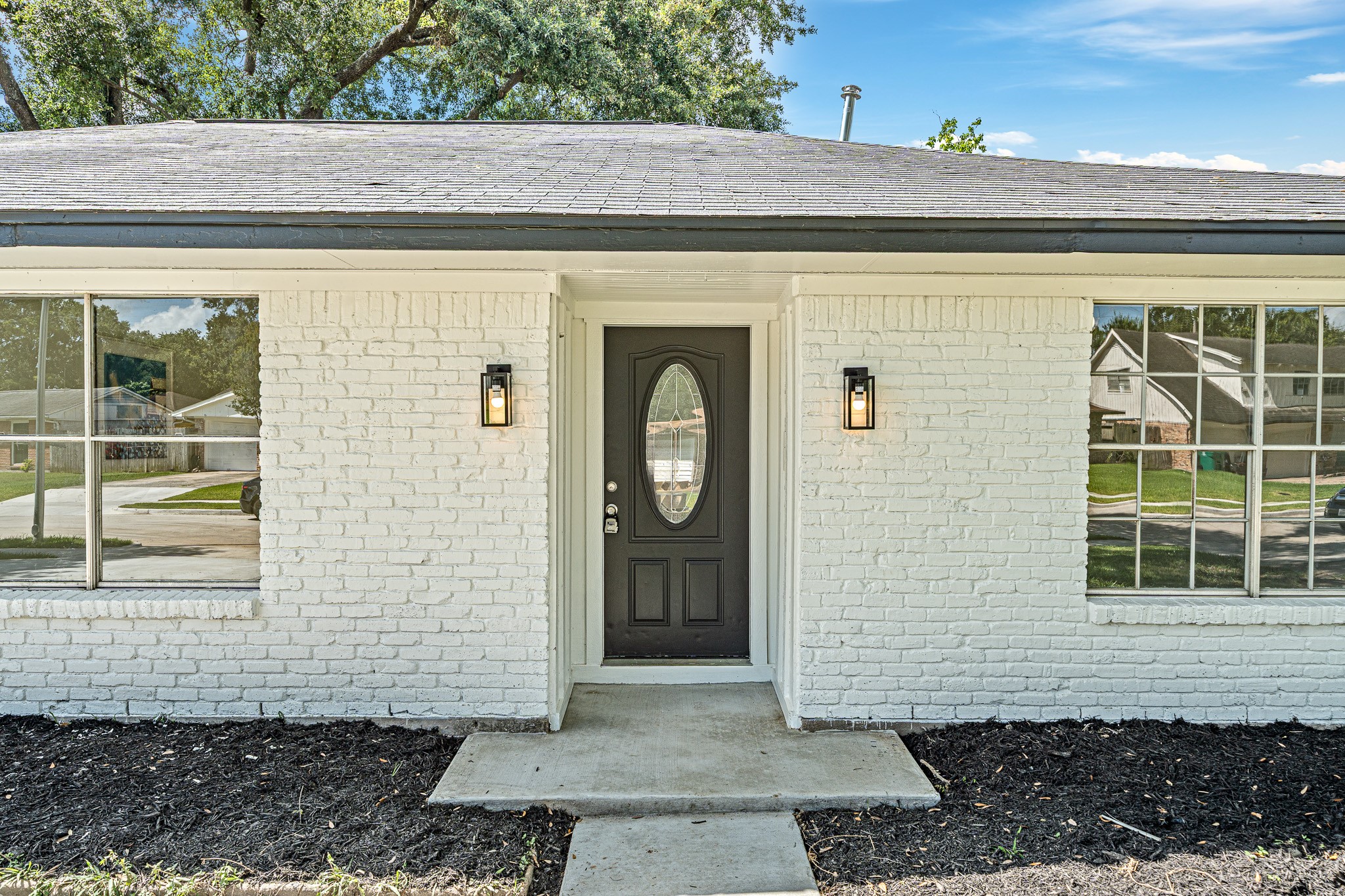 111 Princess Drive Houston, TX 77034 - Photo 4 of 30 a front view of a house with a yard