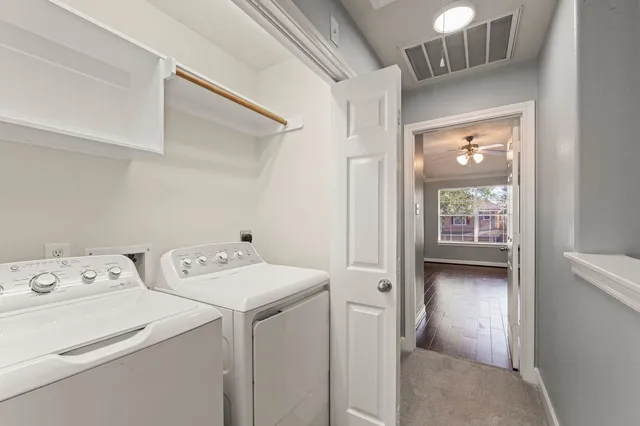 a utility room with dryer and washer