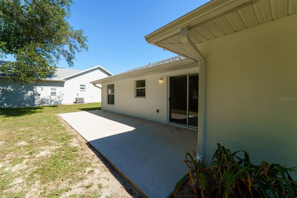 729 Longfellow Terrace Inverness, FL 34450 - Photo 24 of 37 a view of a house with a yard