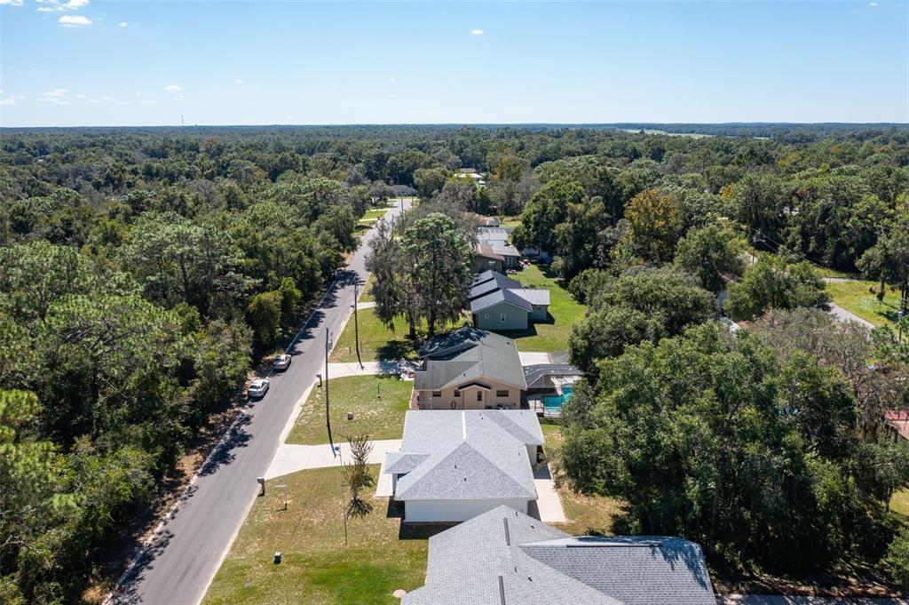 729 Longfellow Terrace Inverness, FL 34450 - Photo 29 of 37 an aerial view of a house with a yard