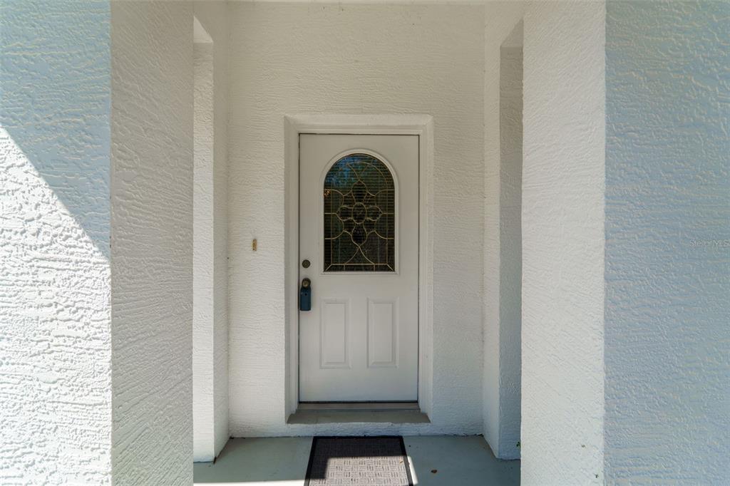 729 Longfellow Terrace Inverness, FL 34450 - Photo 3 of 37 a view of a hallway with entryway