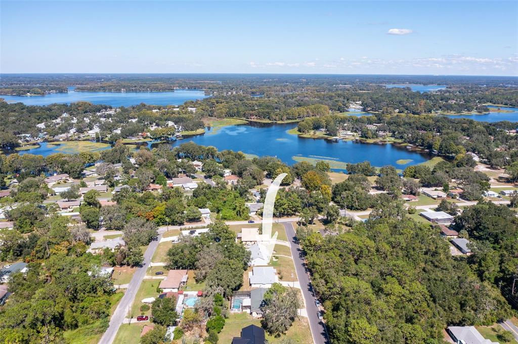 729 Longfellow Terrace Inverness, FL 34450 - Photo 31 of 37 an aerial view of a city with lots of residential buildings