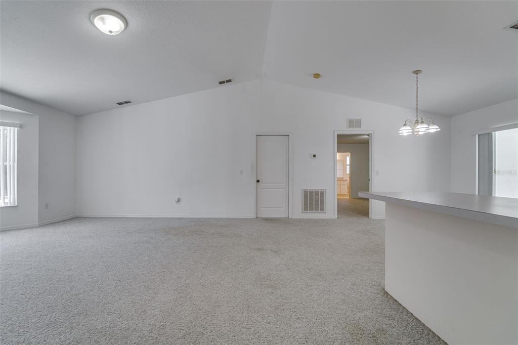 729 Longfellow Terrace Inverness, FL 34450 - Photo 5 of 37 an empty room with a bathroom and a shower