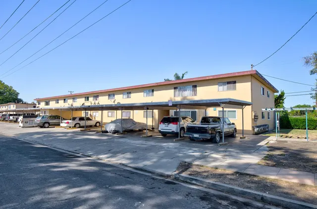 a view of car parked in front of building
