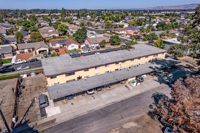 an aerial view of a city with lots of residential buildings