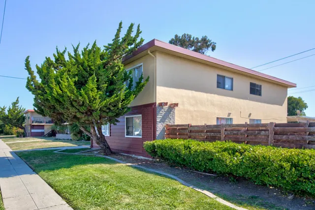 a view of a building with a swimming pool