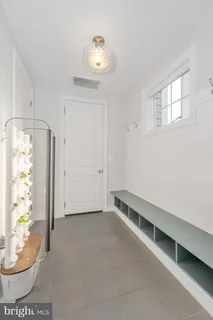 a bathroom with a sink and a window