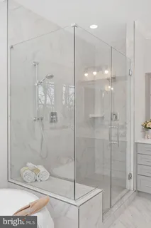 a bathroom with a sink a toilet and a bathtub